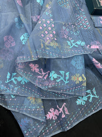 Powdery blue jamdani saree with pink blue and golden jori work.