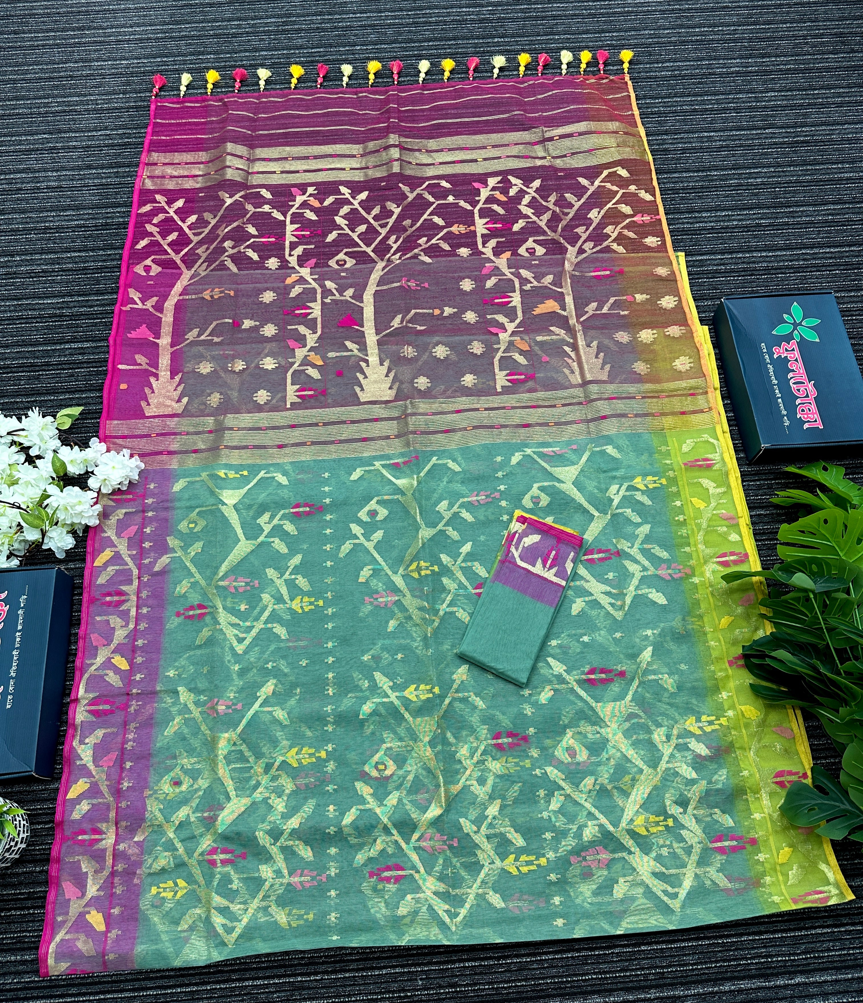Green exclusive gonga jamuna paar halfsilk jamdani saree with golden jori work and pink meena work