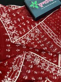 Maroon jamdani saree with white thread work.