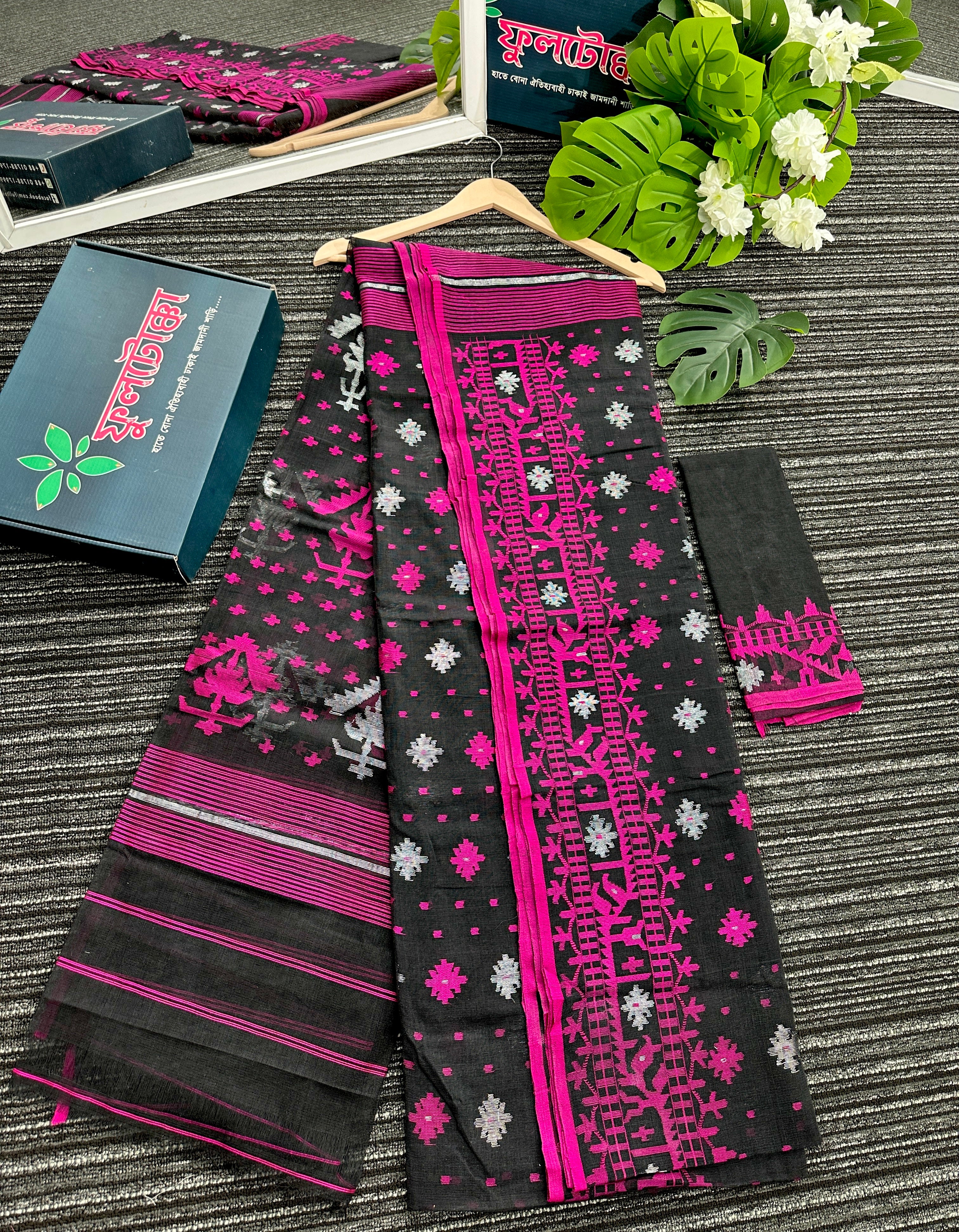 Black cotton jamdani saree with magenta threads work and silver jori work