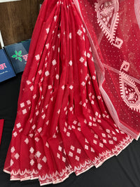 Radish Maroon cotton jamdani saree with white threads work all over work.