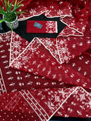 Maroon jamdani saree with white thread work.