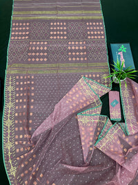 Onion colour jamdani saree with pink meena and green border.