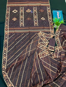 Brown colour jamdani saree with brown & off white threads work.