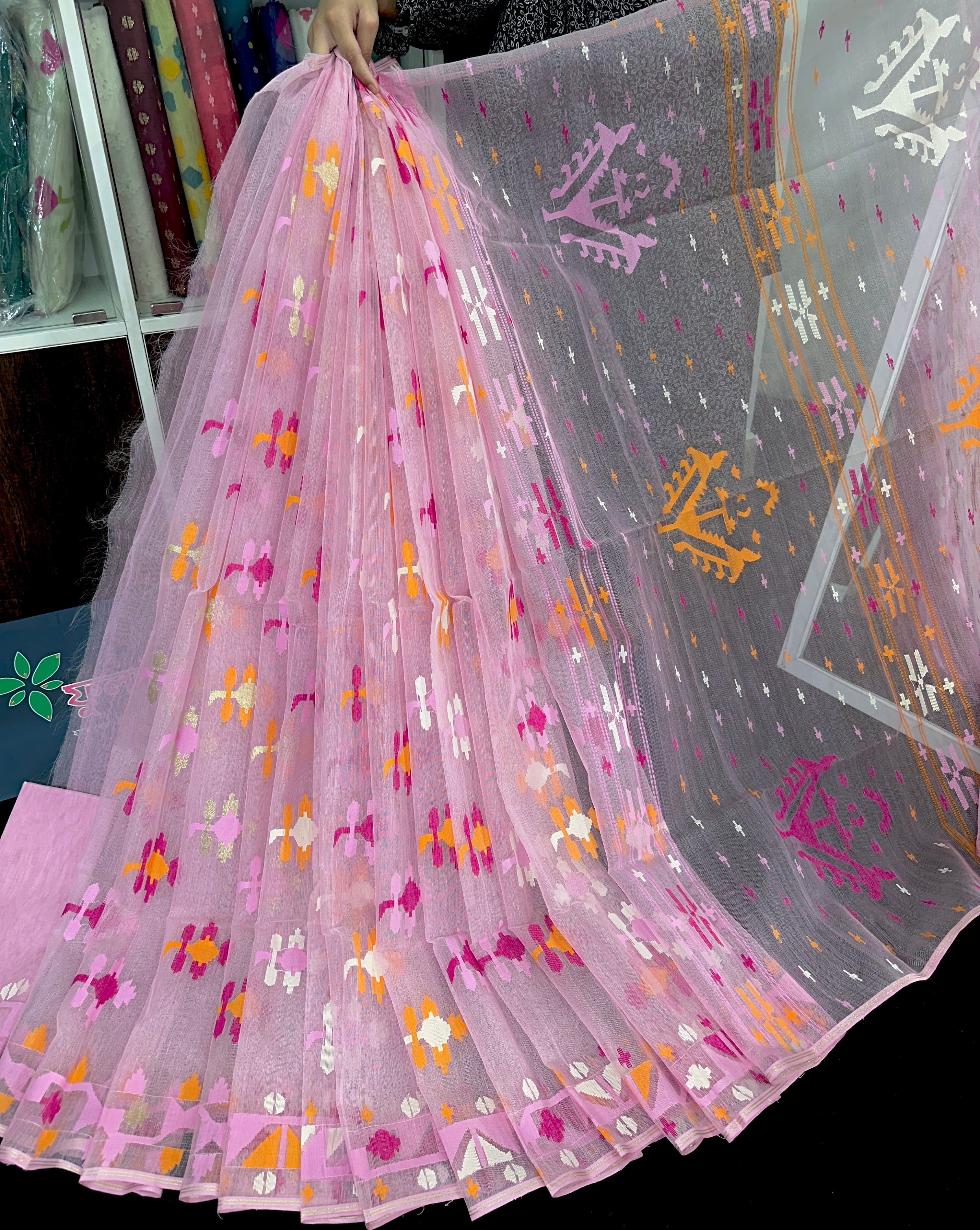 Baby pink halfsilk jamdani saree with white orange pink threads work