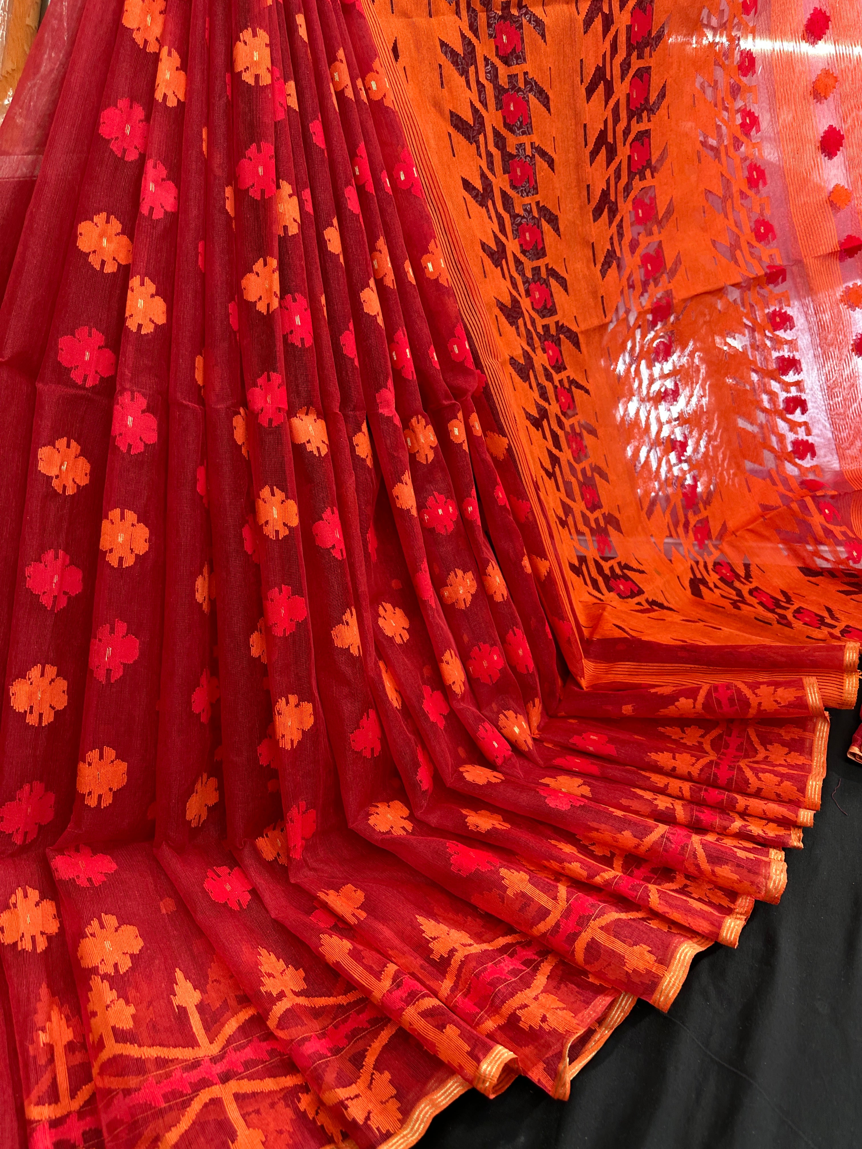 Maroon red jamdani saree with orange and red threads work