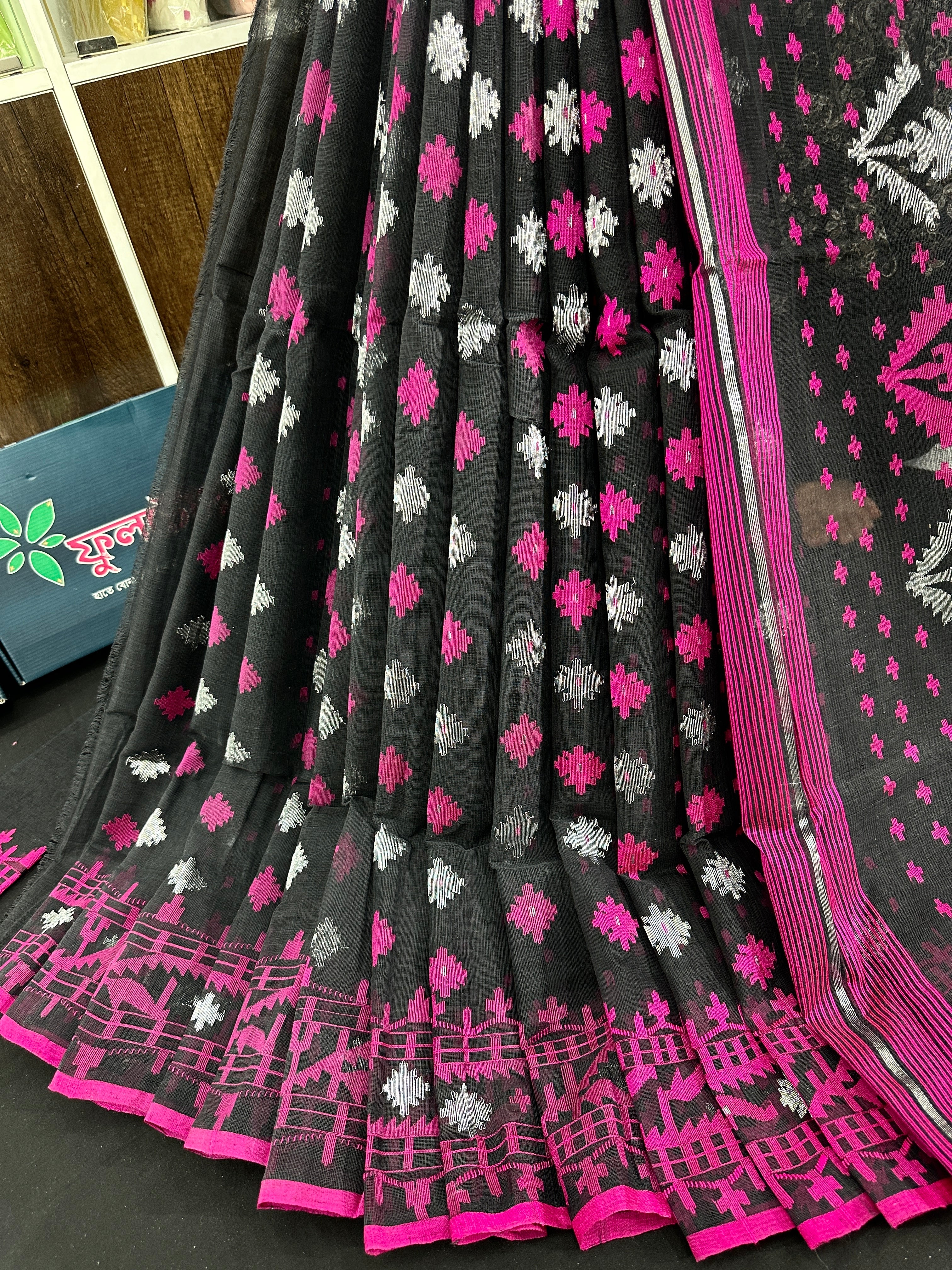 Black cotton jamdani saree with magenta threads work and silver jori work