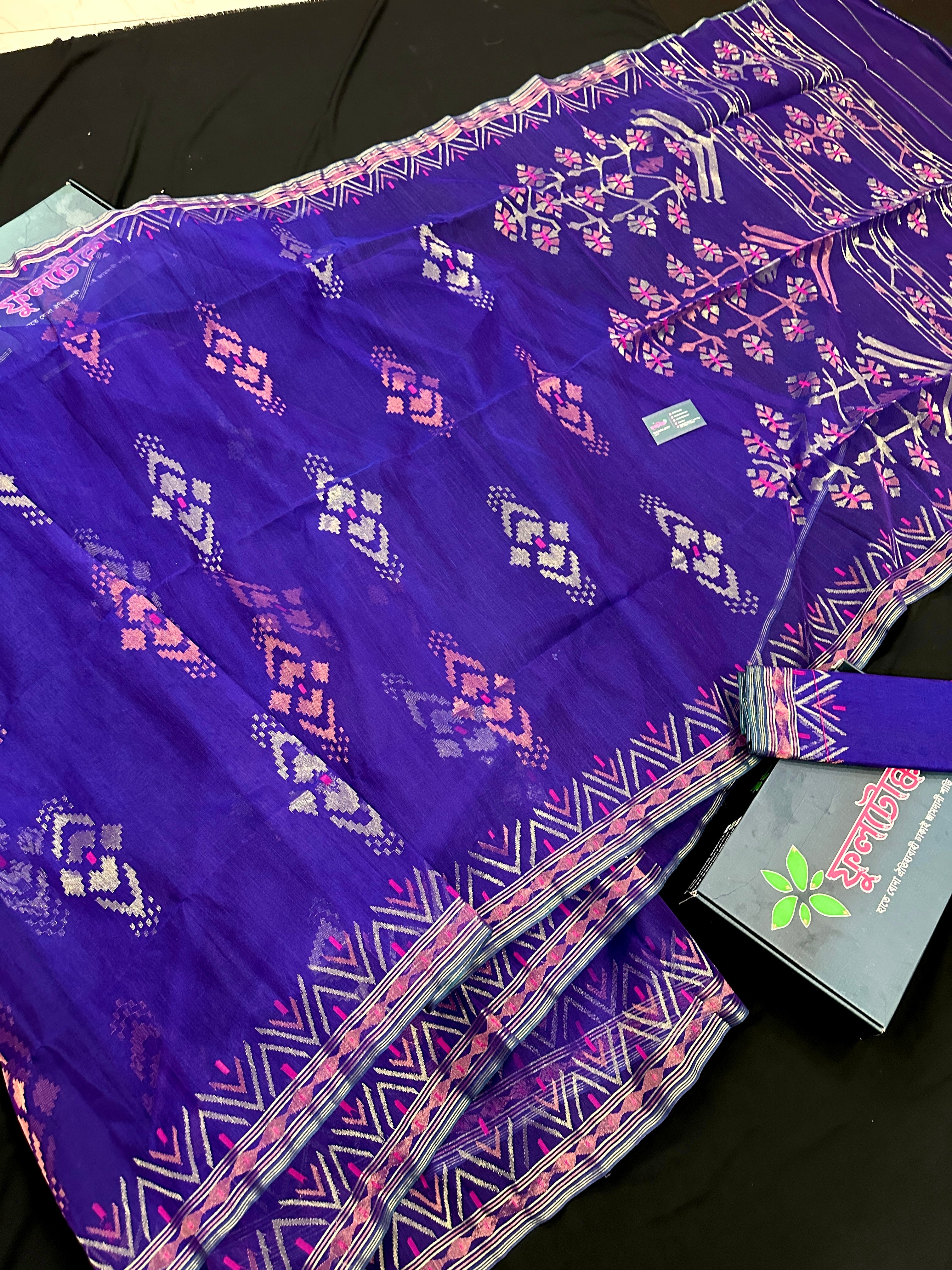 Purple exclusive jamdani saree with golden silver and copper jori work.
