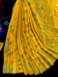 Yellow cotton jamdani saree with orange grey green blue colour threads work.