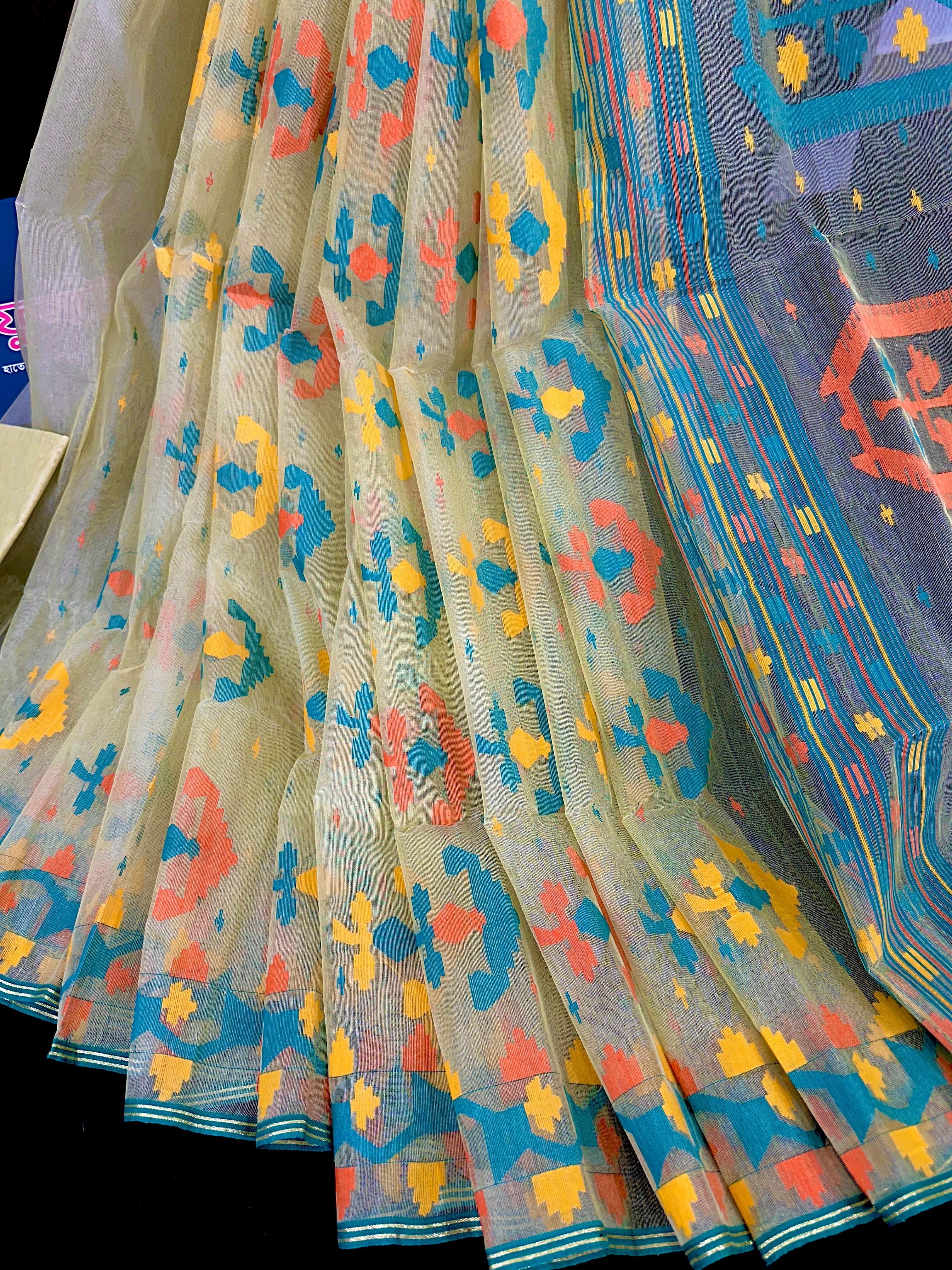 Basonti colour halfsilk jamdani saree with orange blue yellow threads work