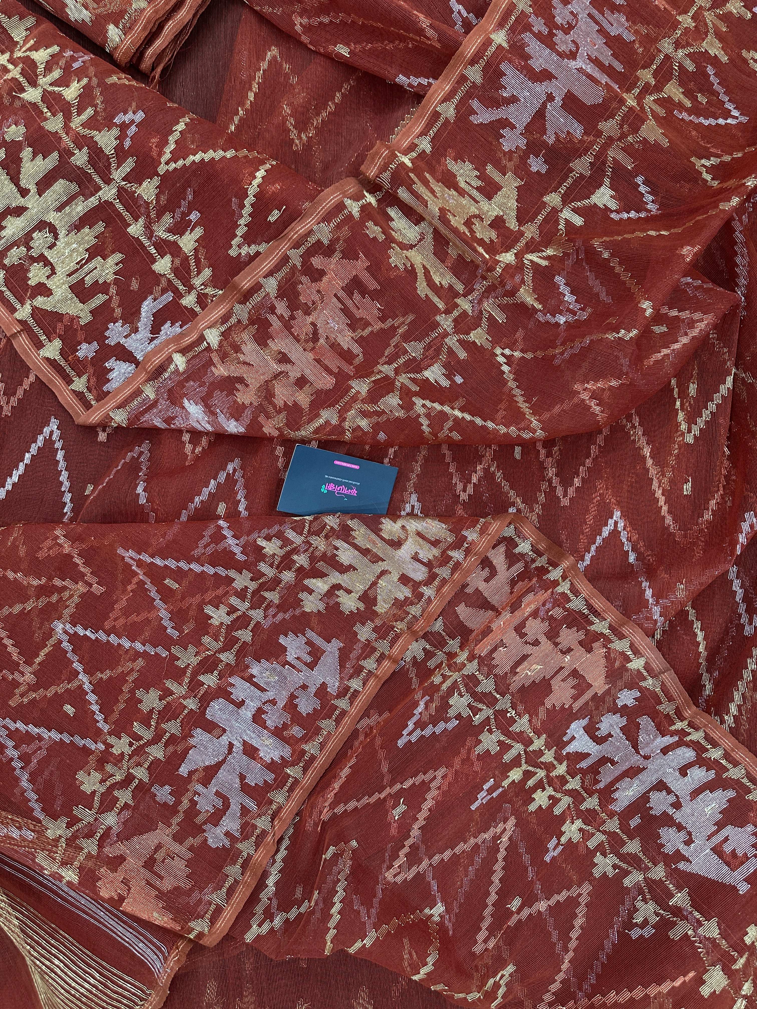 Brown reshom halfsilk jamdani saree with golden silver & copper jori work.