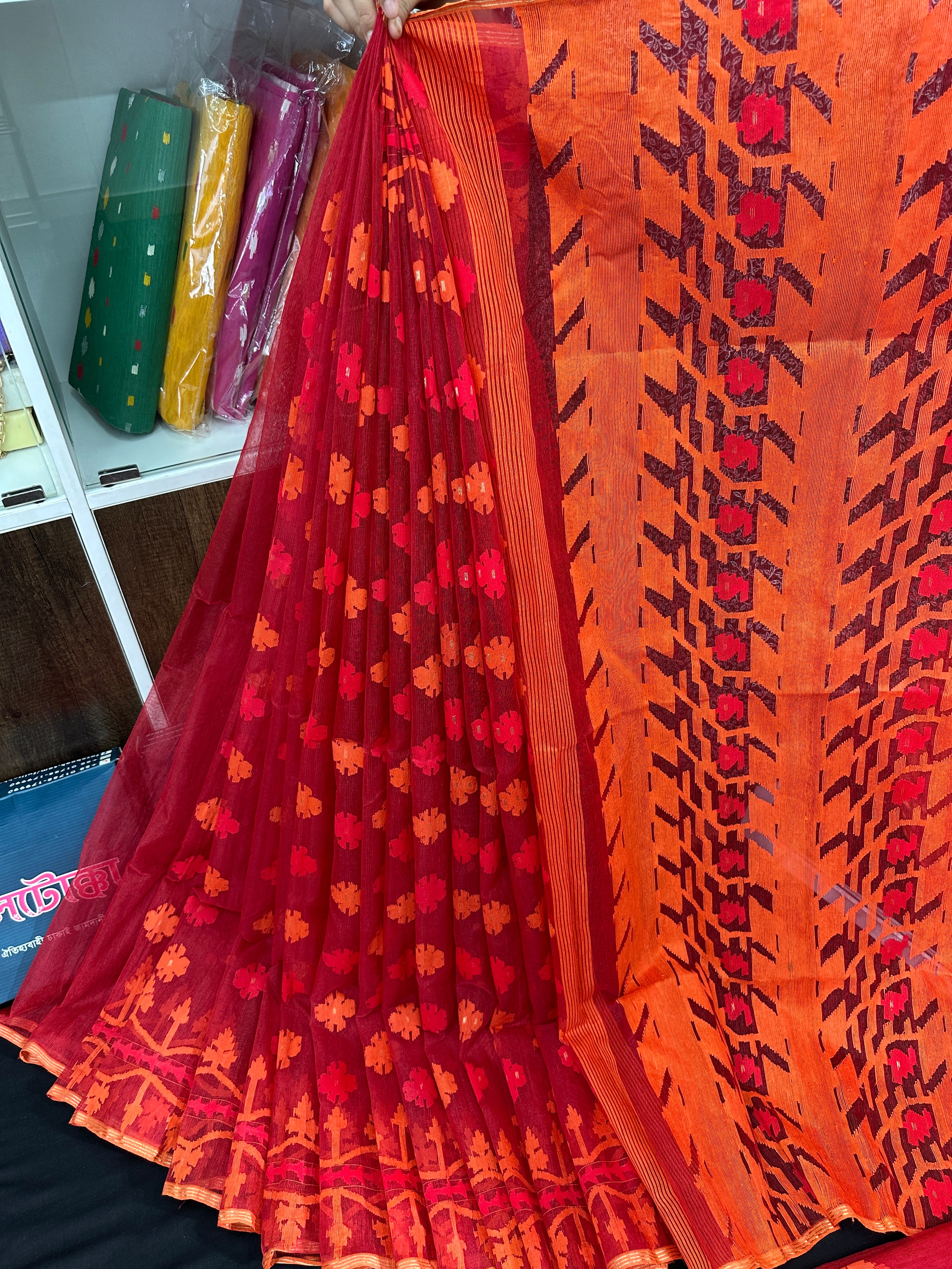 Maroon red jamdani saree with orange and red threads work