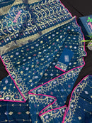 Peacock blue jamdani saree with golden silver copper jori work and pink border
