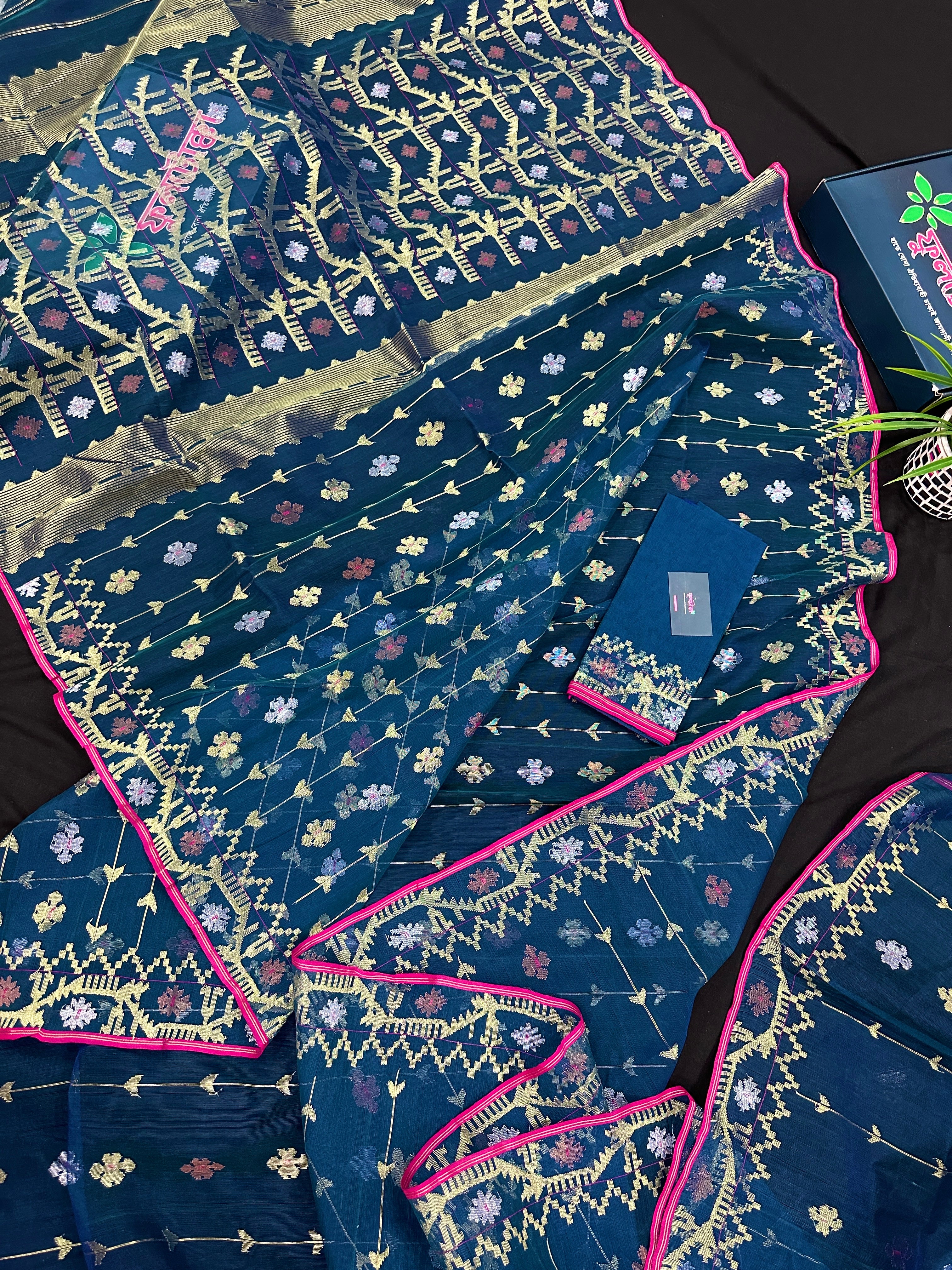 Peacock blue jamdani saree with golden silver copper jori work and pink border