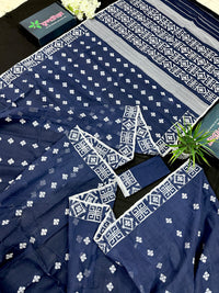 Deep blue jandani saree with white threads all over work.