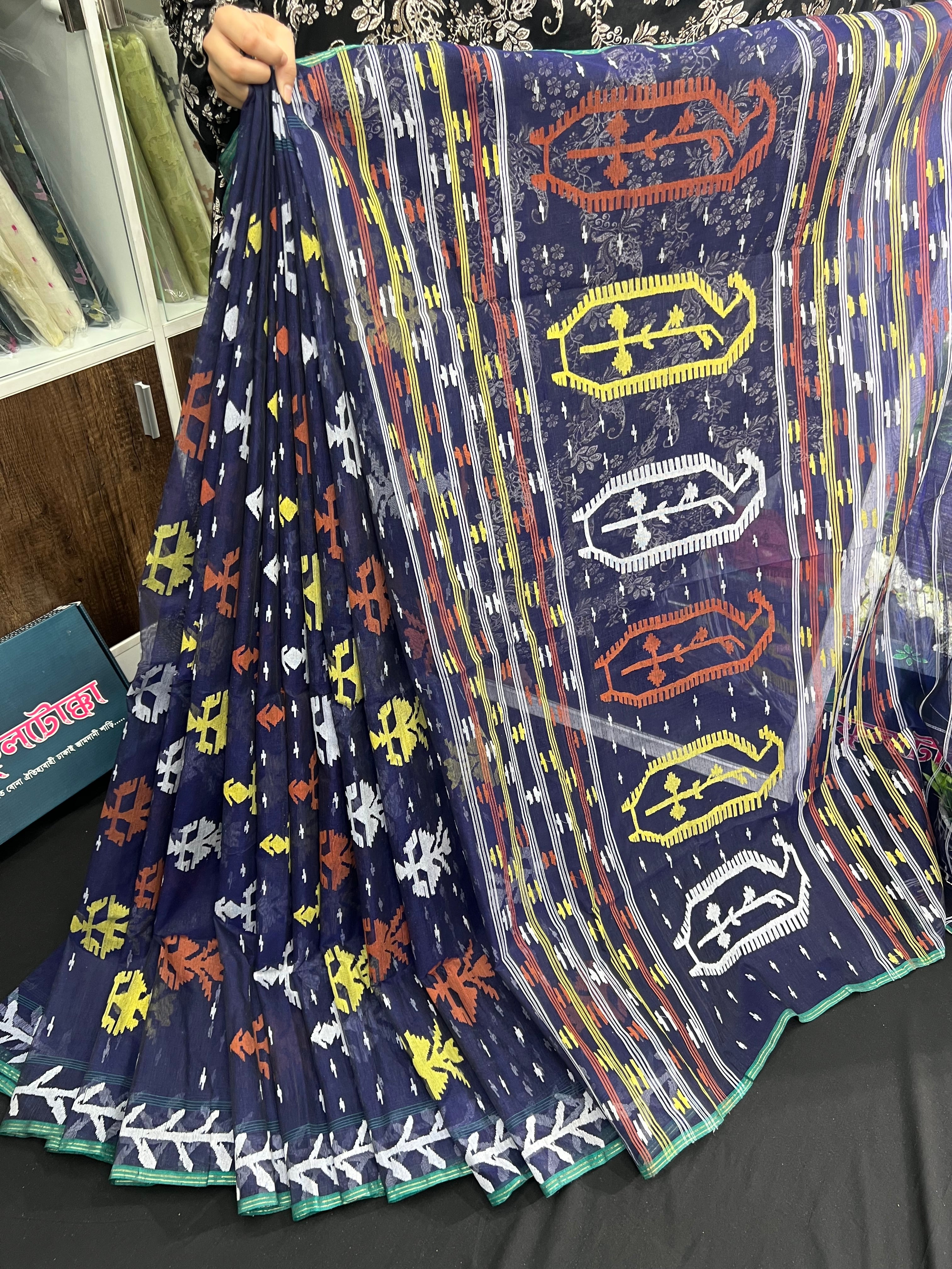 Deep blue halfsilk jamdani saree with orange yellow white threads work