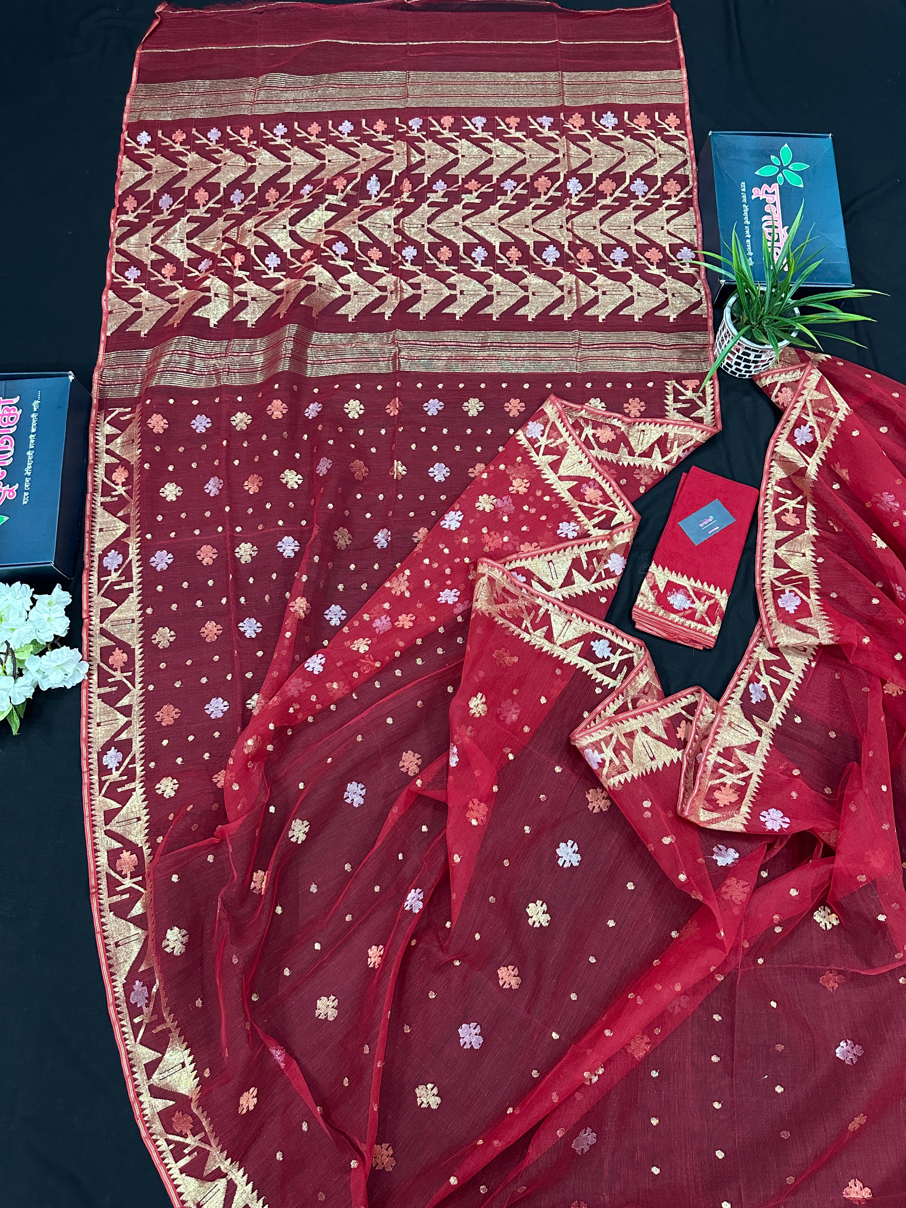 Red jamdani saree with golden jori all over work with blouse piece.