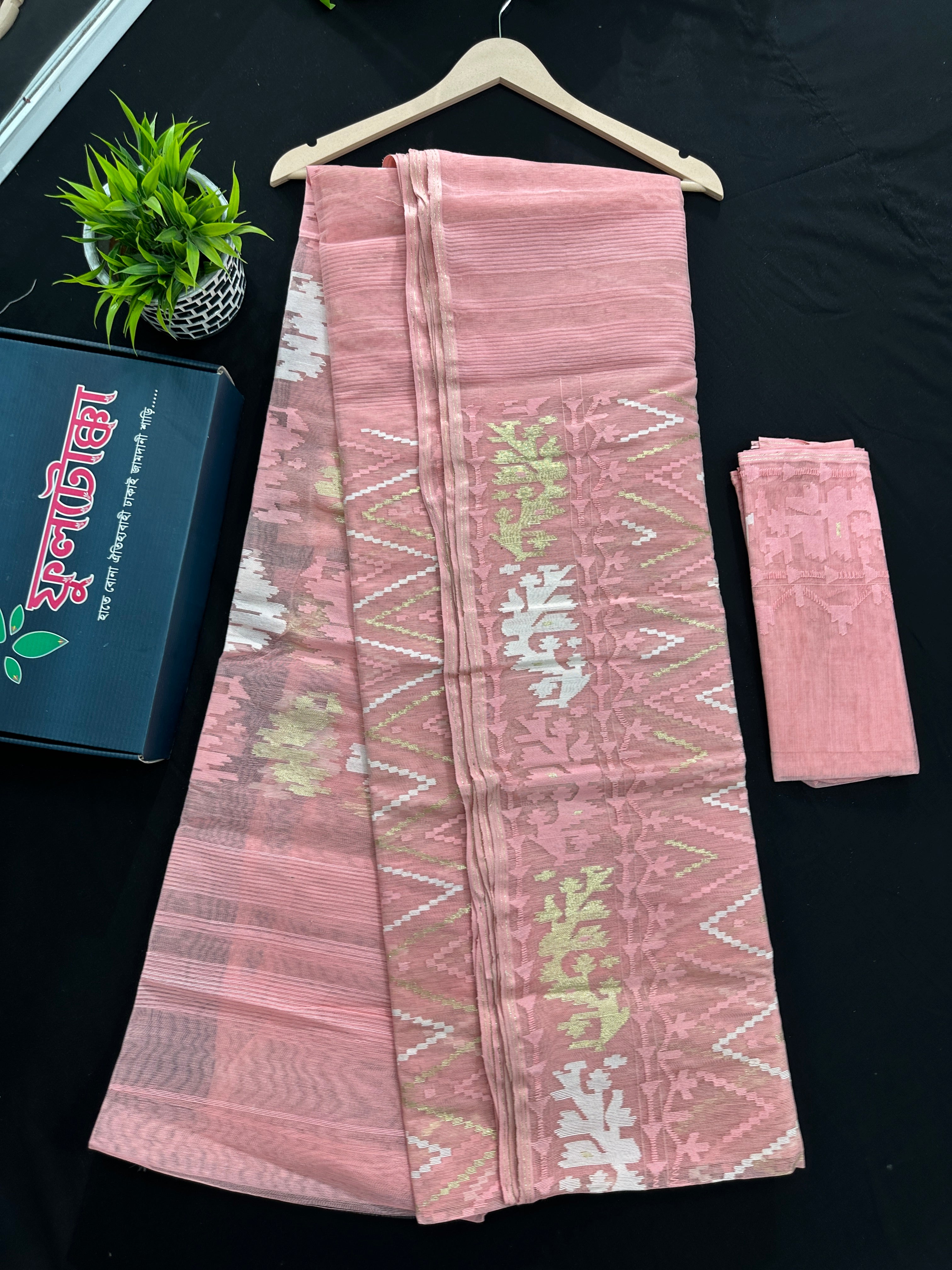 Blushing peach halfsilk jamdani saree with golden jori work and white threads work