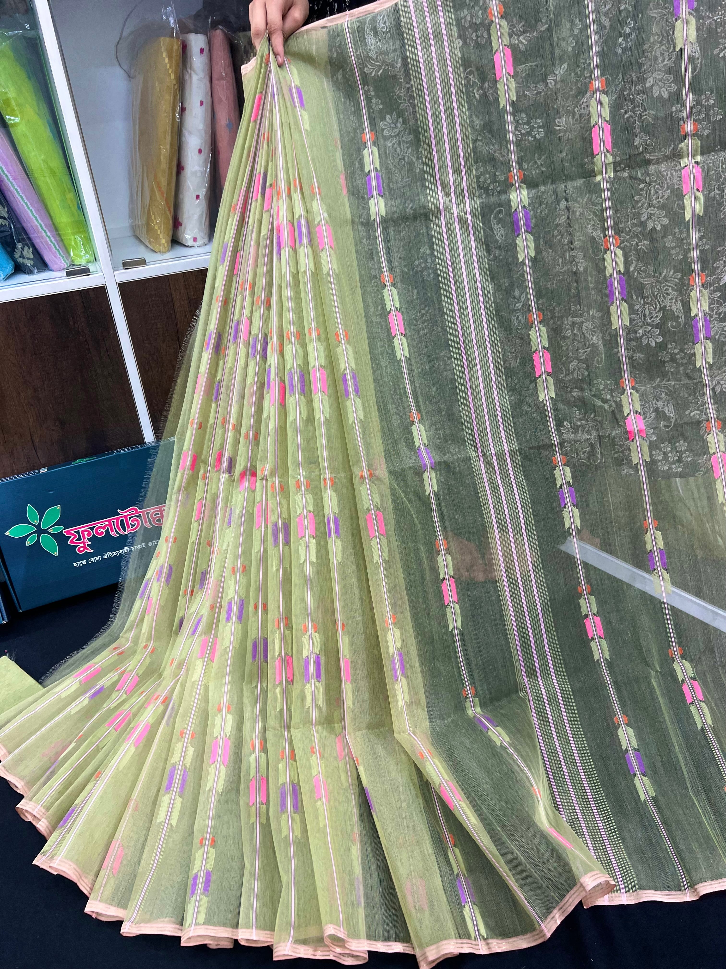 Lite olive halfsilk jamdani saree with pink blue olive threads work