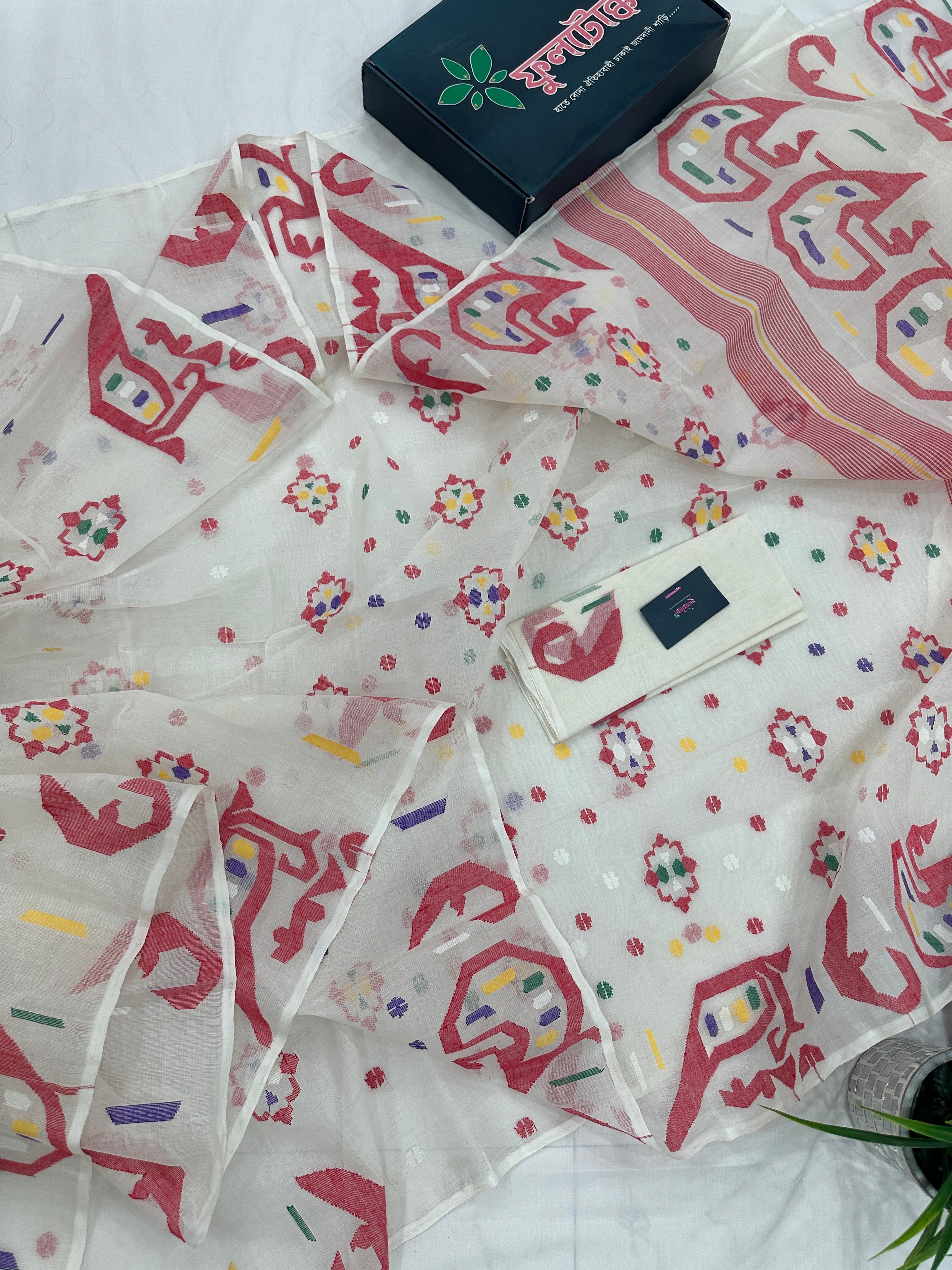 White cotton jamdani saree with multiple colour threads work and blouse piece.