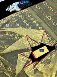 Pastel yellow dhakai jamdani saree with yellow threads silver & copper jori work all over work soft count.
