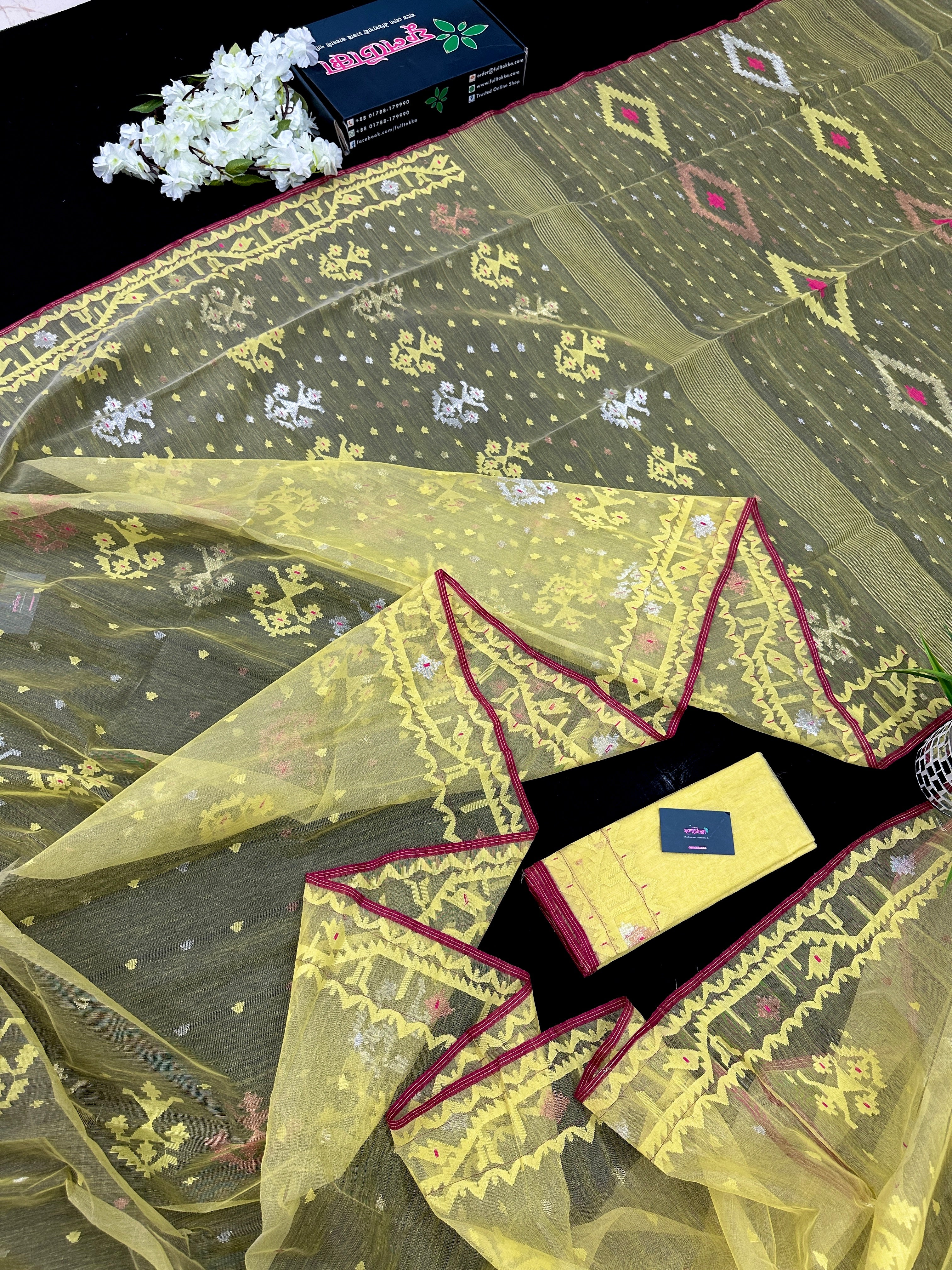 Pastel yellow dhakai jamdani saree with yellow threads silver & copper jori work all over work soft count.