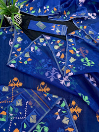 Royal blue jamdani saree with green pink blue orange threads work.