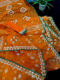 Orange soft jamdani saree with silver jori work & green border.