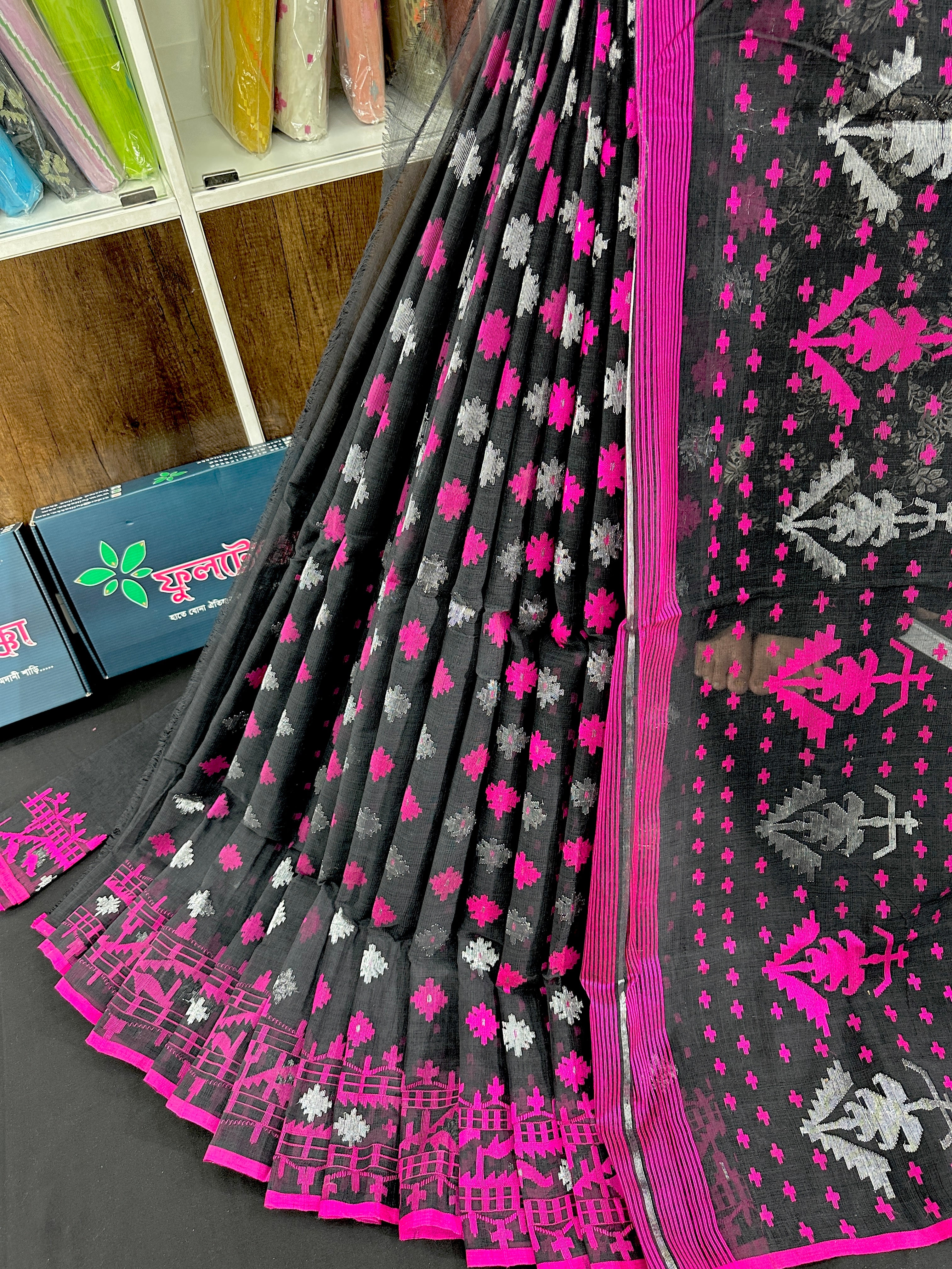Black cotton jamdani saree with magenta threads work and silver jori work