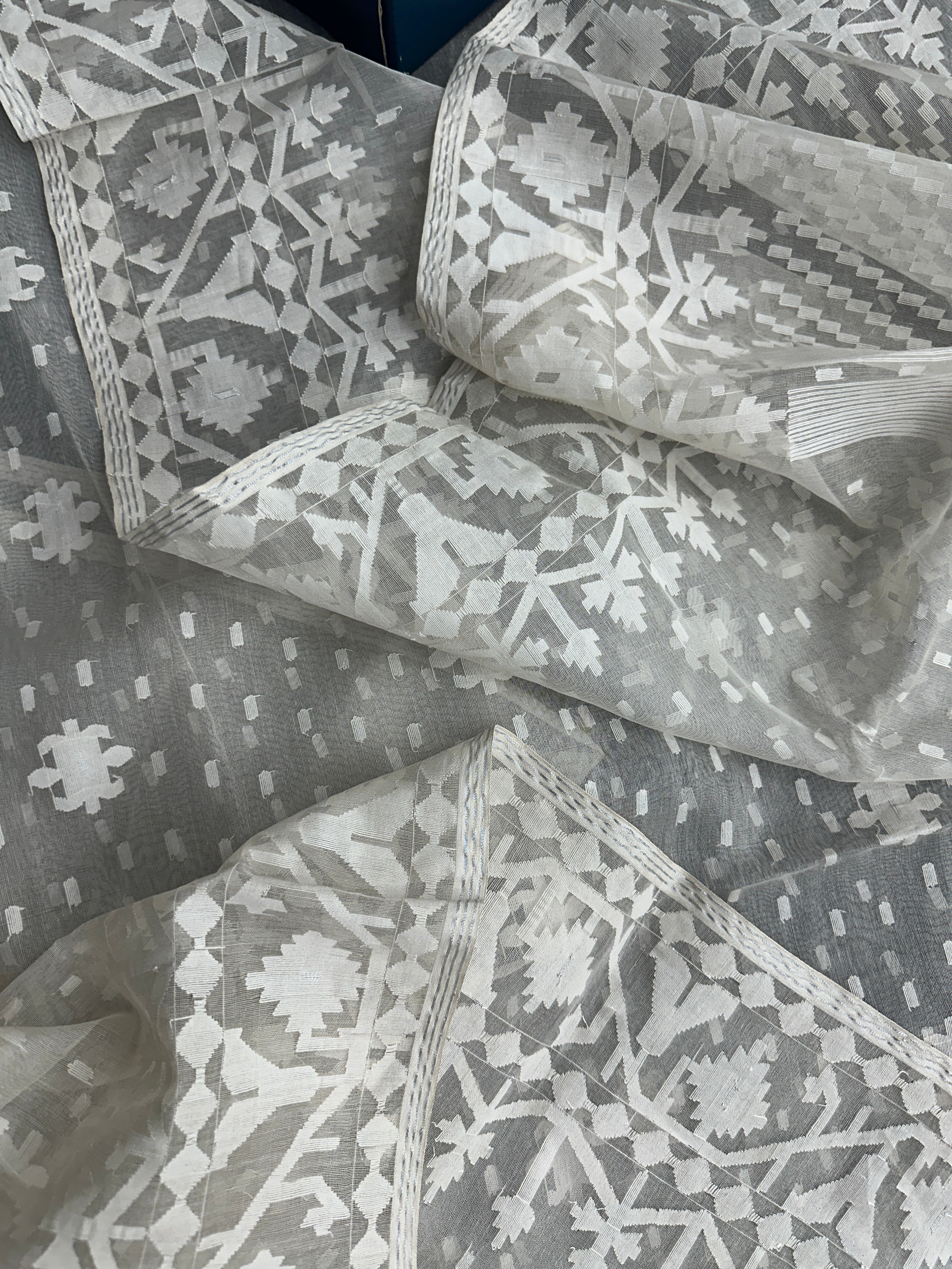 White exclusive halfsilk jamdani saree with white threads work and blouse piece