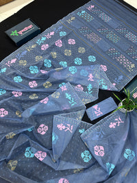Powdery blue jamdani saree with pink blue and golden jori work.