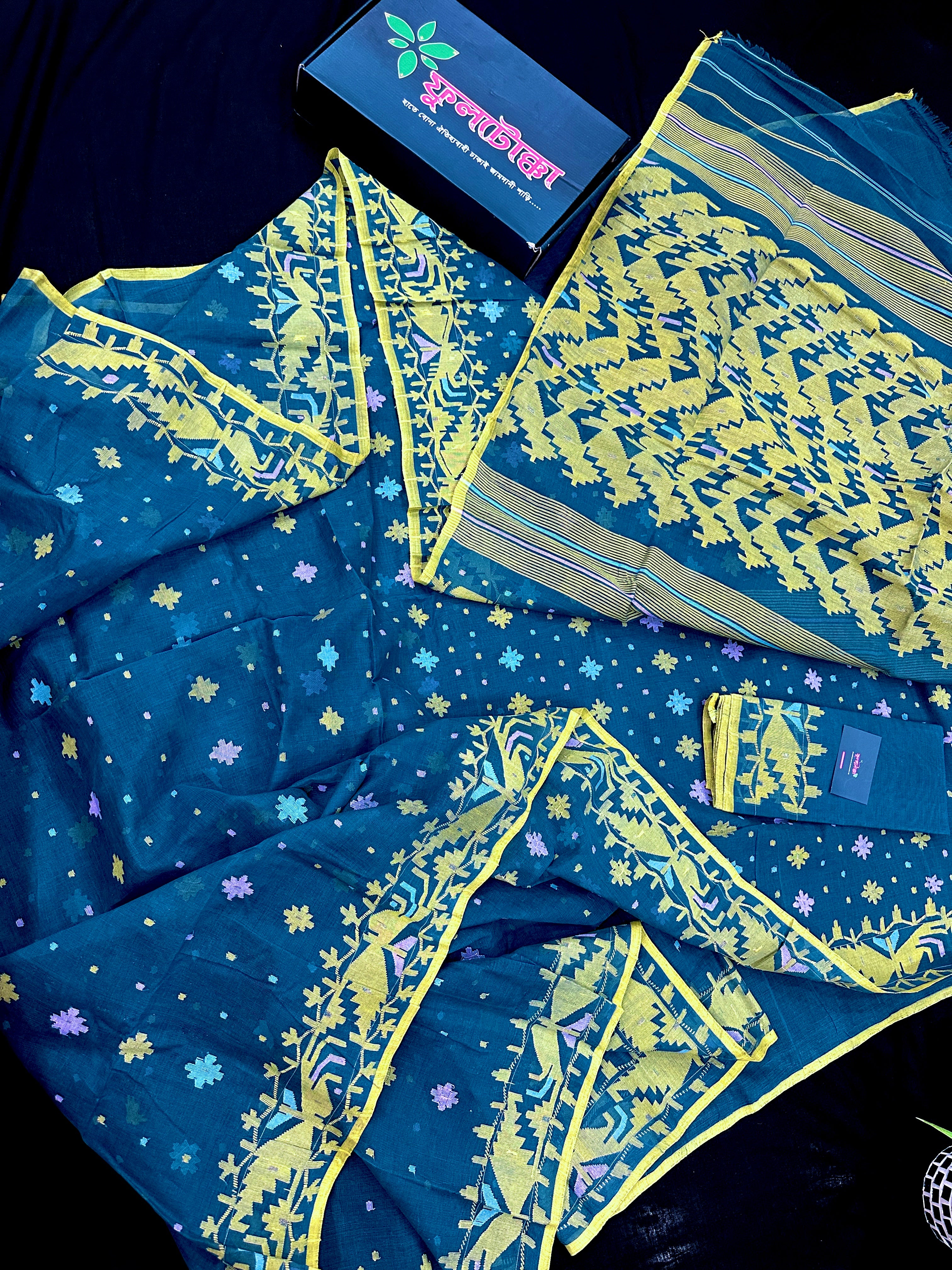 Peacock blue cotton jamdani saree with yellow threads work all over soft count