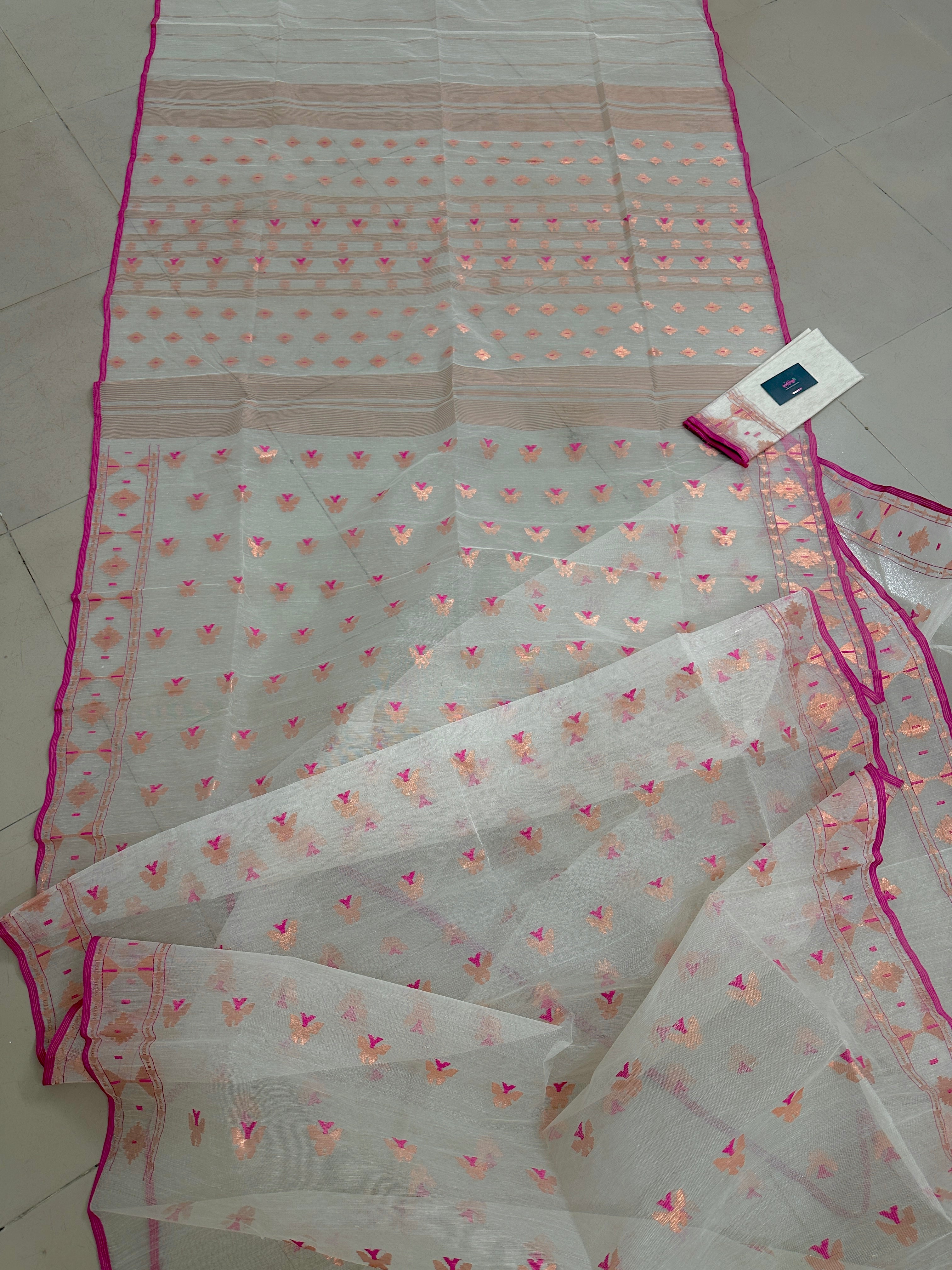 White Jamdani Saree Features Intricate Copper Jori Work.