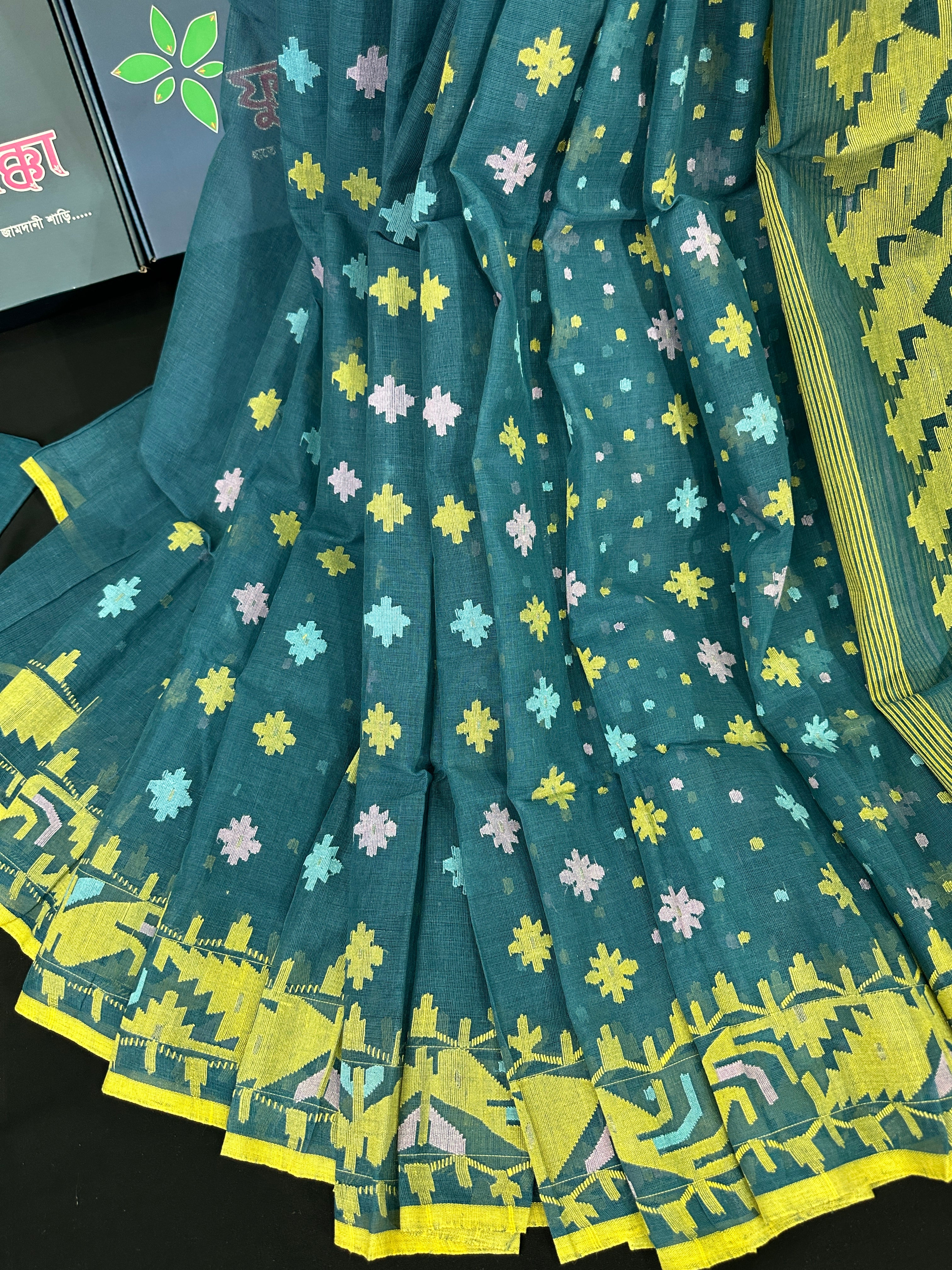 Sea green cotton jamdani saree with yellow pink blue threads work