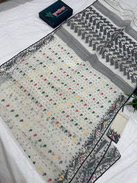 White cotton jamdani saree with black red yellow green threads work & blouse piece.