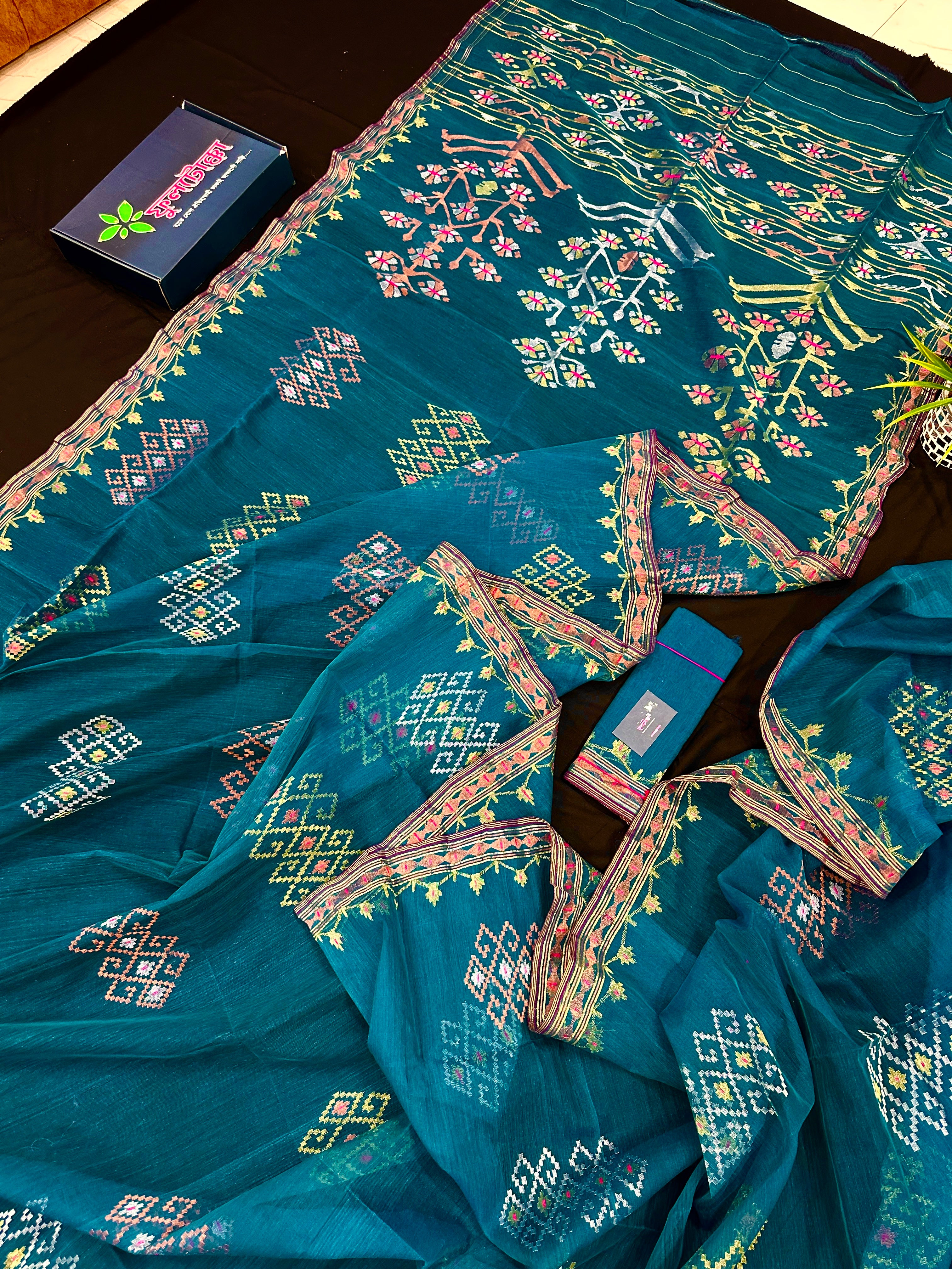 Sea green jamdani saree with golden silver & copper jori work soft count.