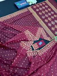Maroon cotton jamdani with yellowish threads work.