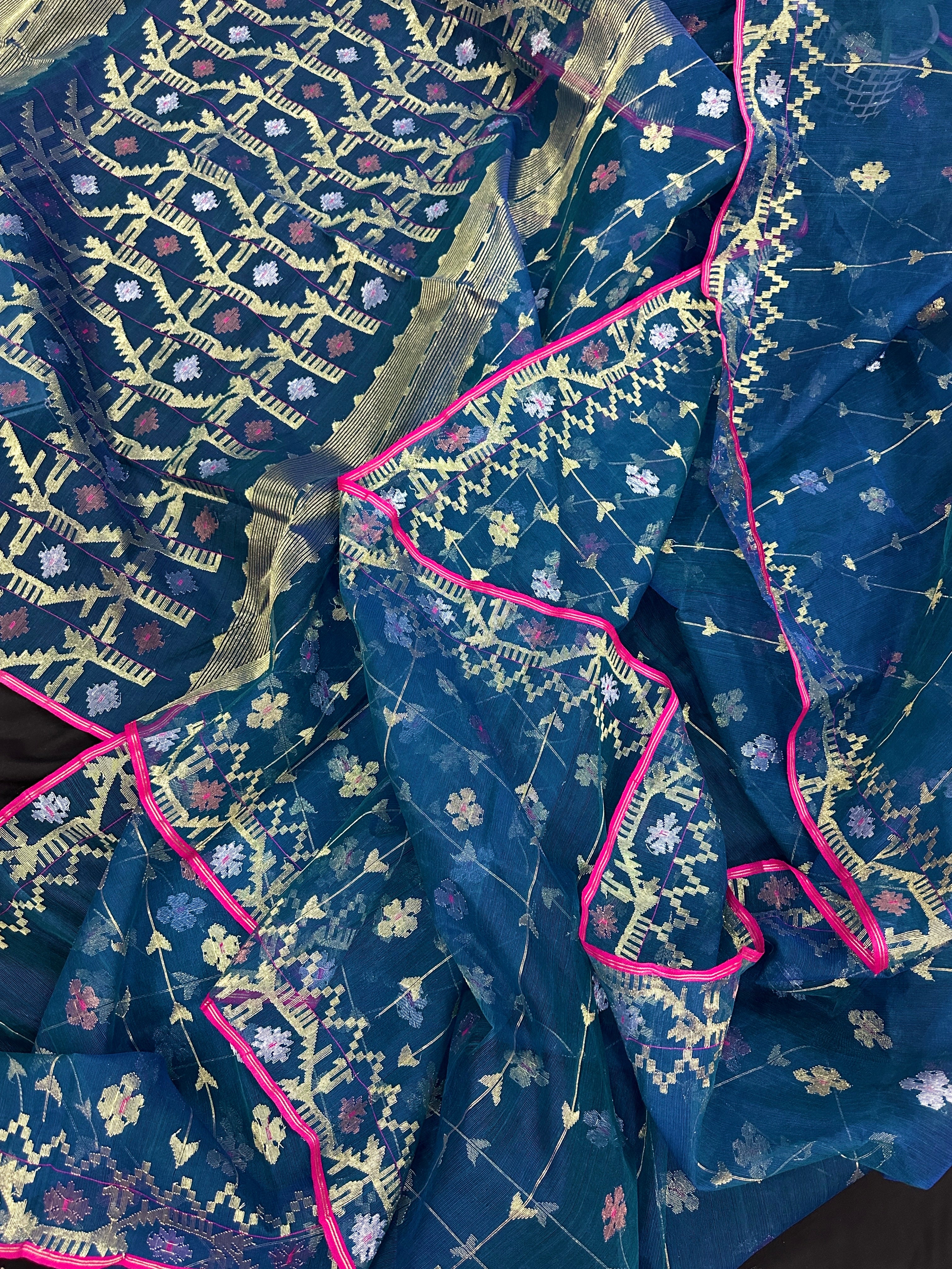 Peacock blue jamdani saree with golden silver copper jori work and pink border