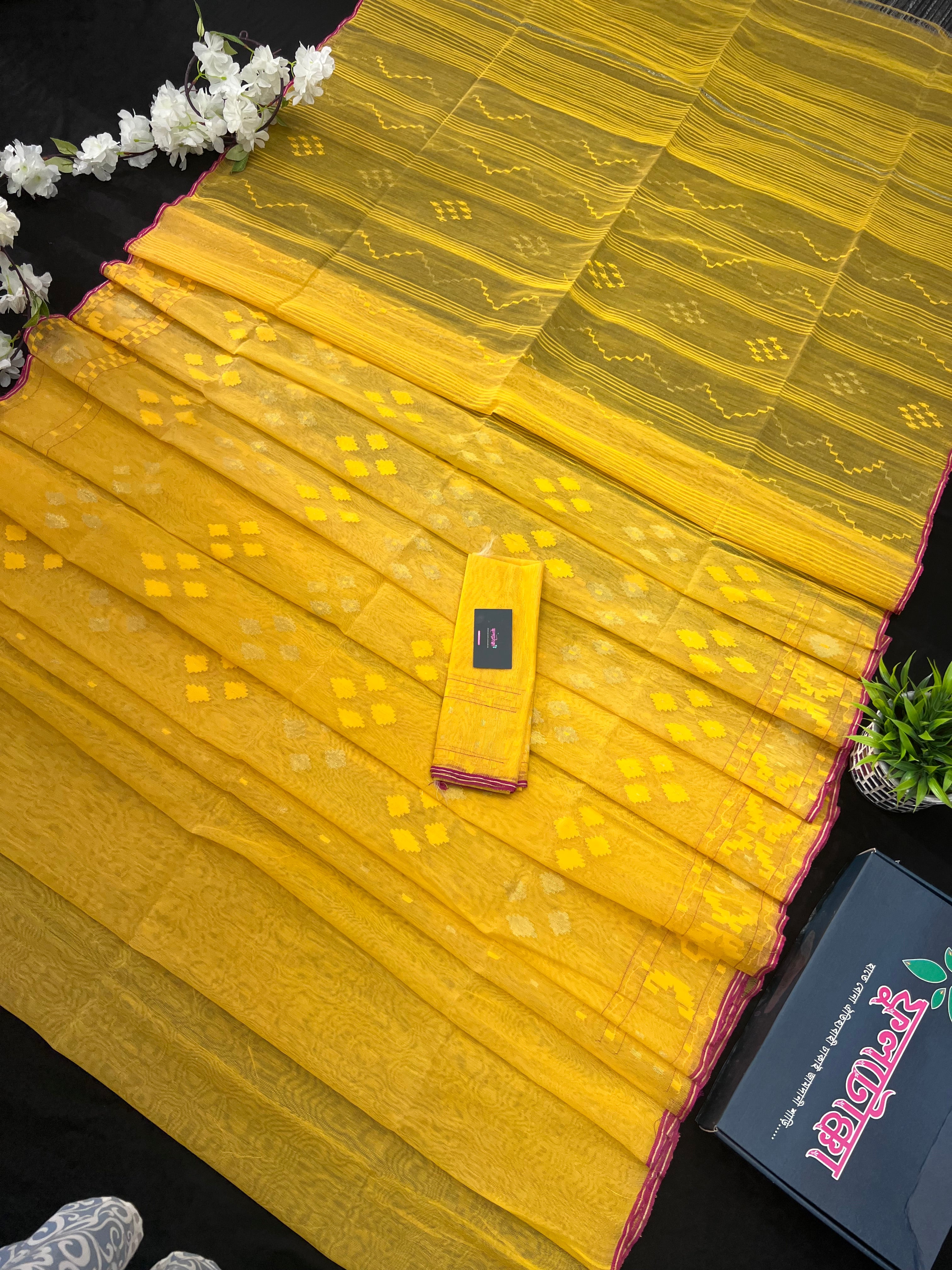 Yellow colour handloom halfsilk dhakai jamdani saree with pink border