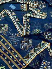 Navy blue jamdani saree with orange  green & off white threads work.