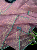 Onion colour jamdani saree with pink meena and green border.