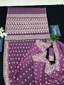 Onion cotton jamdani saree with yellowish threads work all over work.