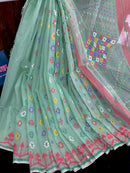 Mint cotton jamdani saree with yellow blue purple red white floral work.