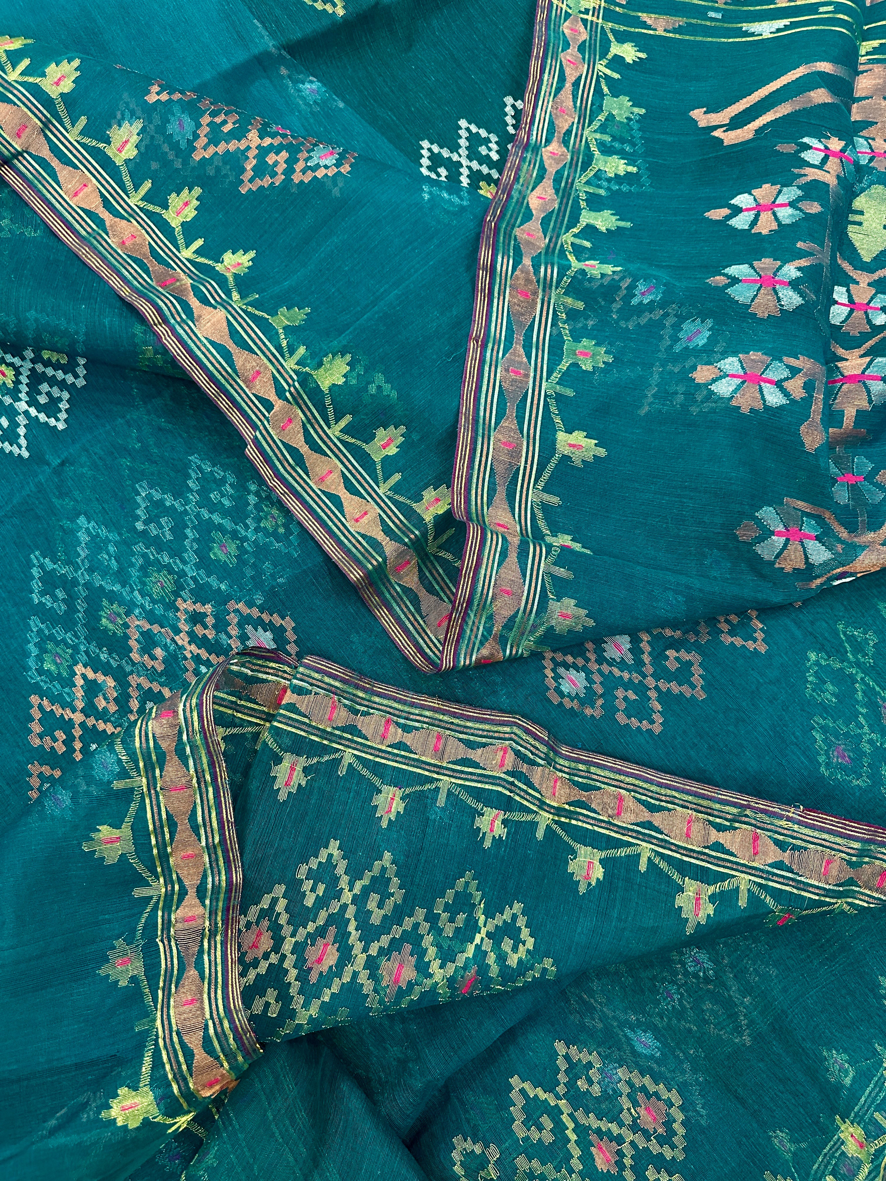 Sea green jamdani saree with golden silver & copper jori work soft count.