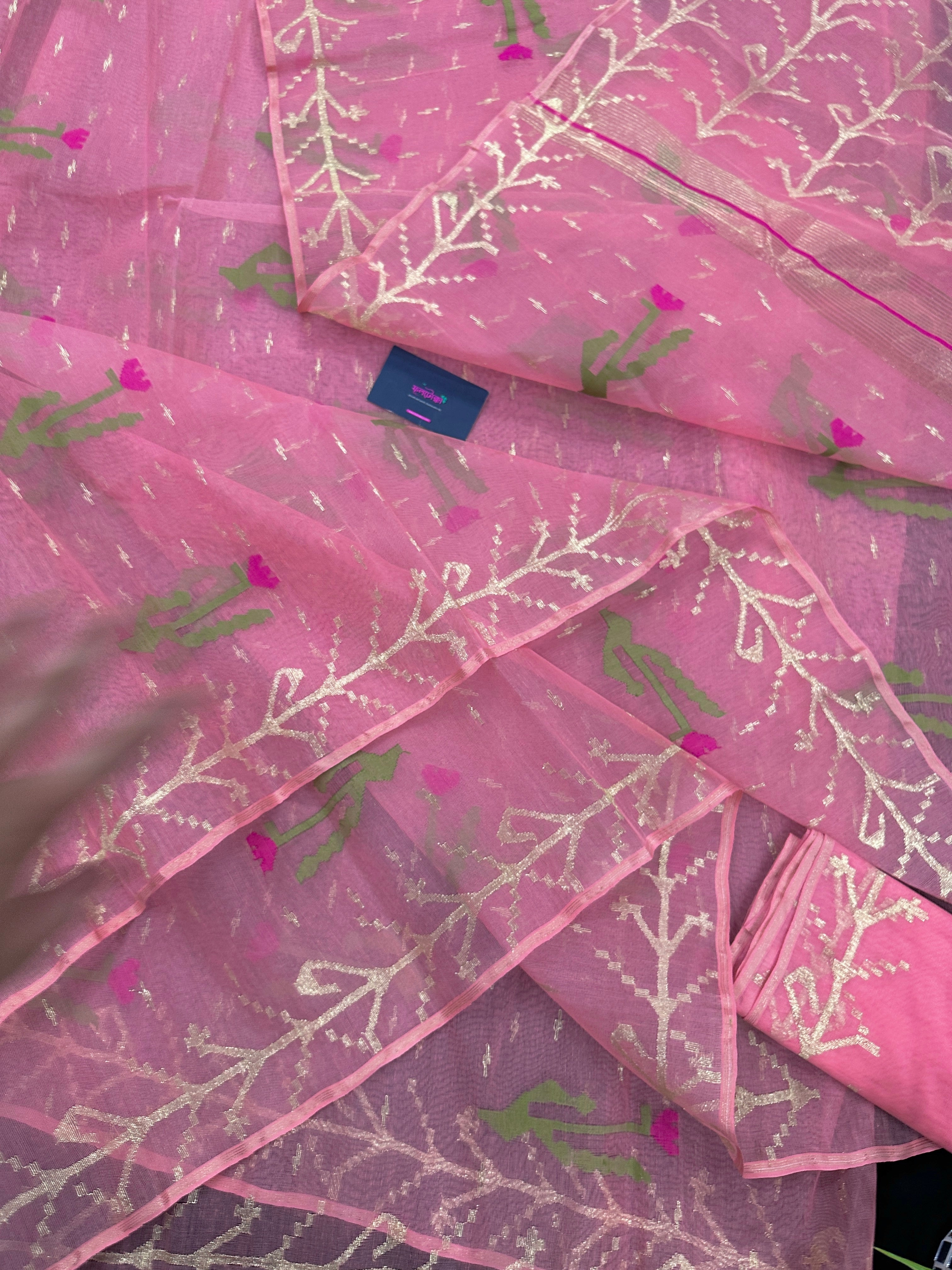 Rosy pink dhakai jamdani saree with golden jori work green thread work and pink flower soft count