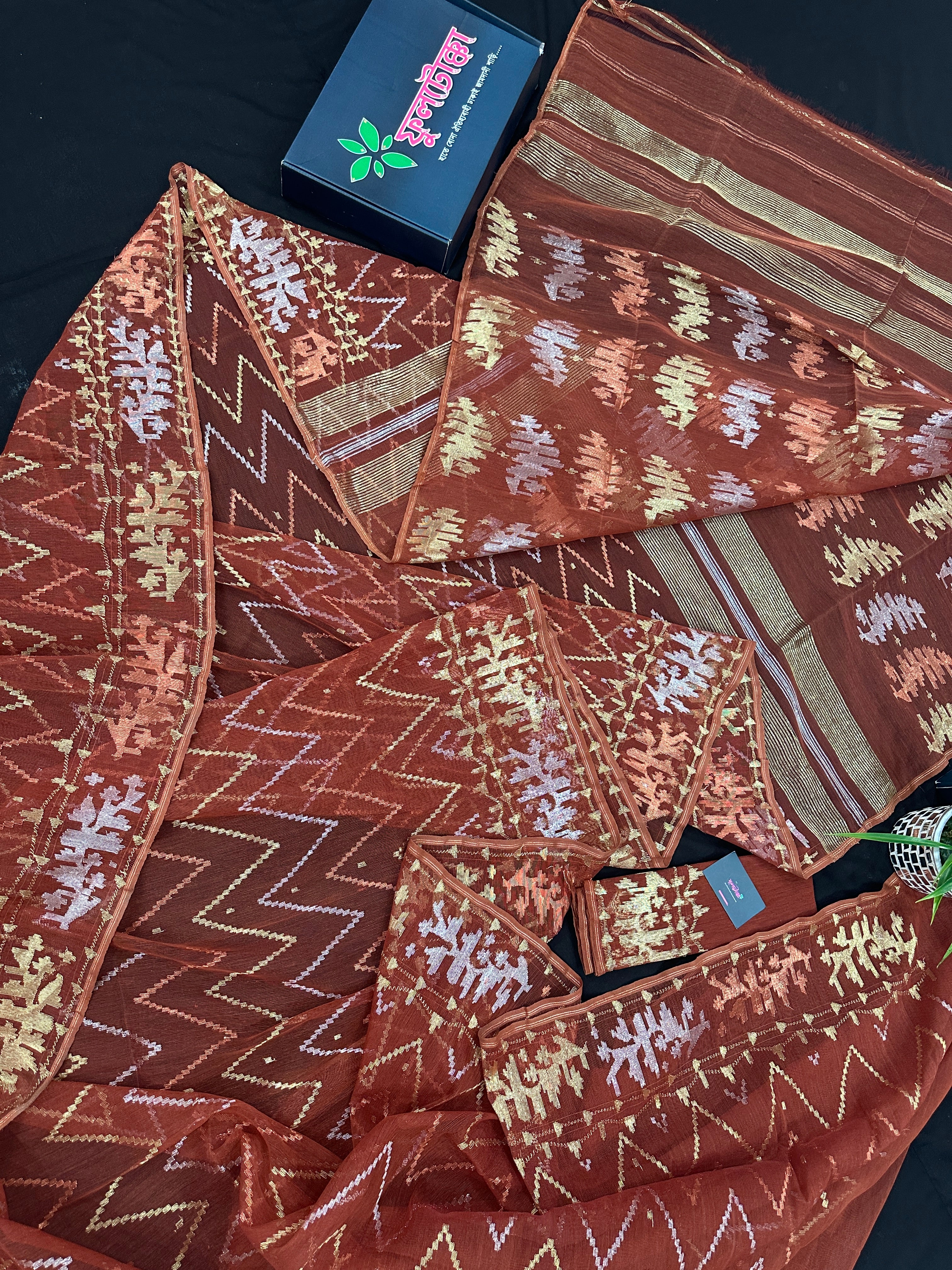 Brown reshom halfsilk jamdani saree with golden silver & copper jori work.