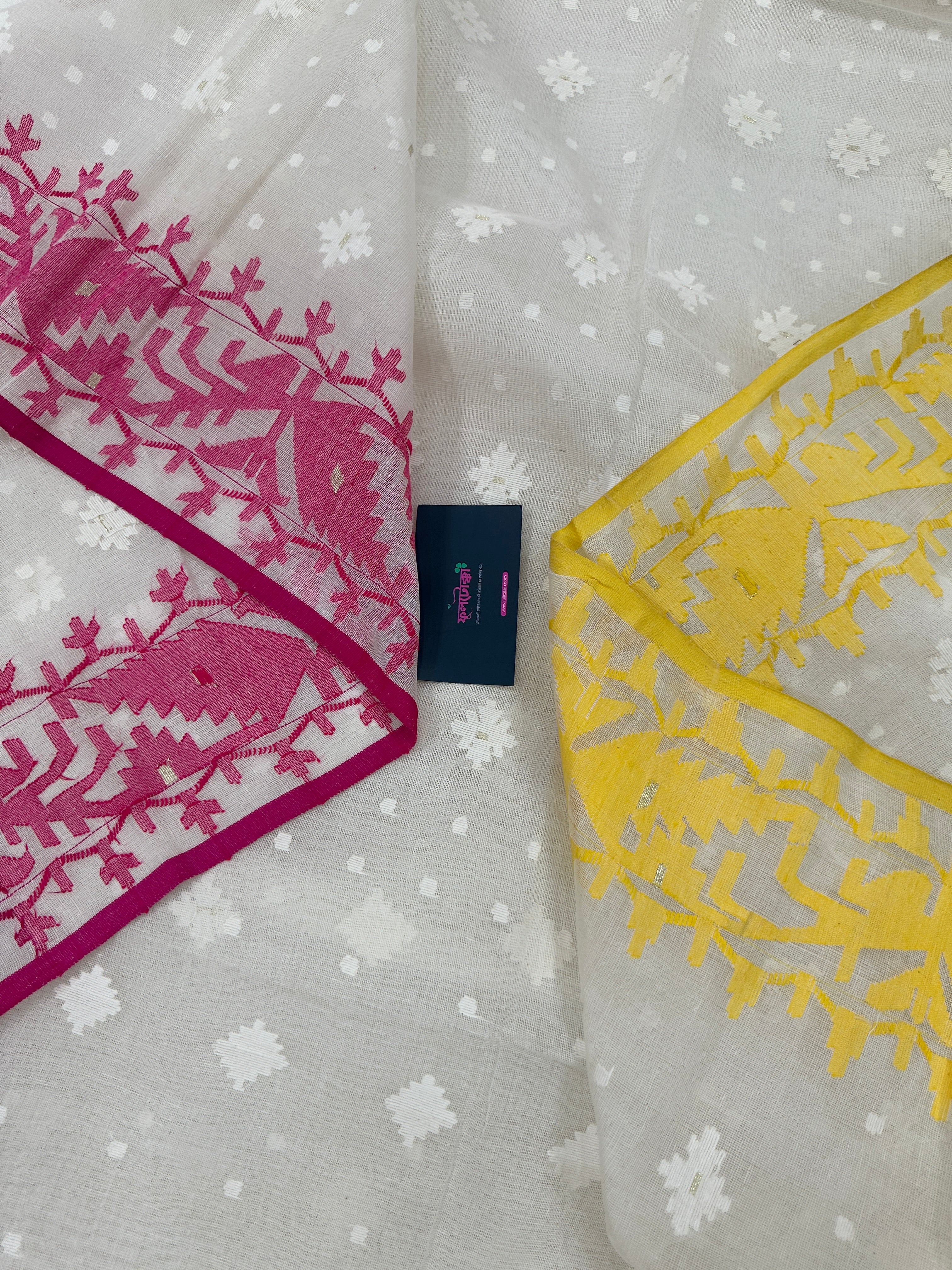 White cotton gonga jamuna design jamdani saree with pink & yellow threads work.