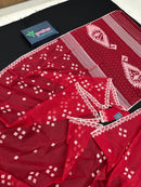Radish Maroon cotton jamdani saree with white threads work all over work.