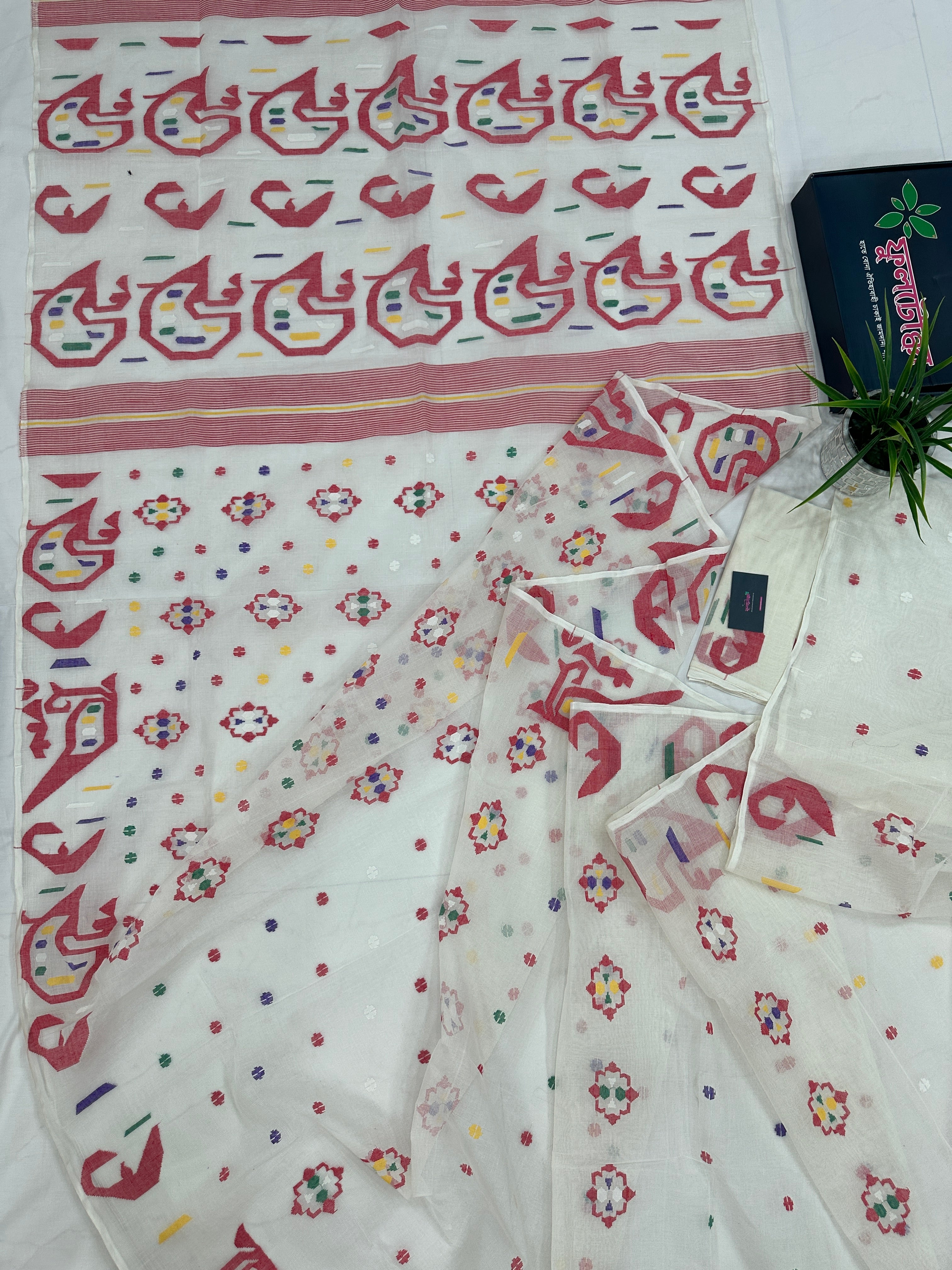 White cotton jamdani saree with multiple colour threads work and blouse piece.