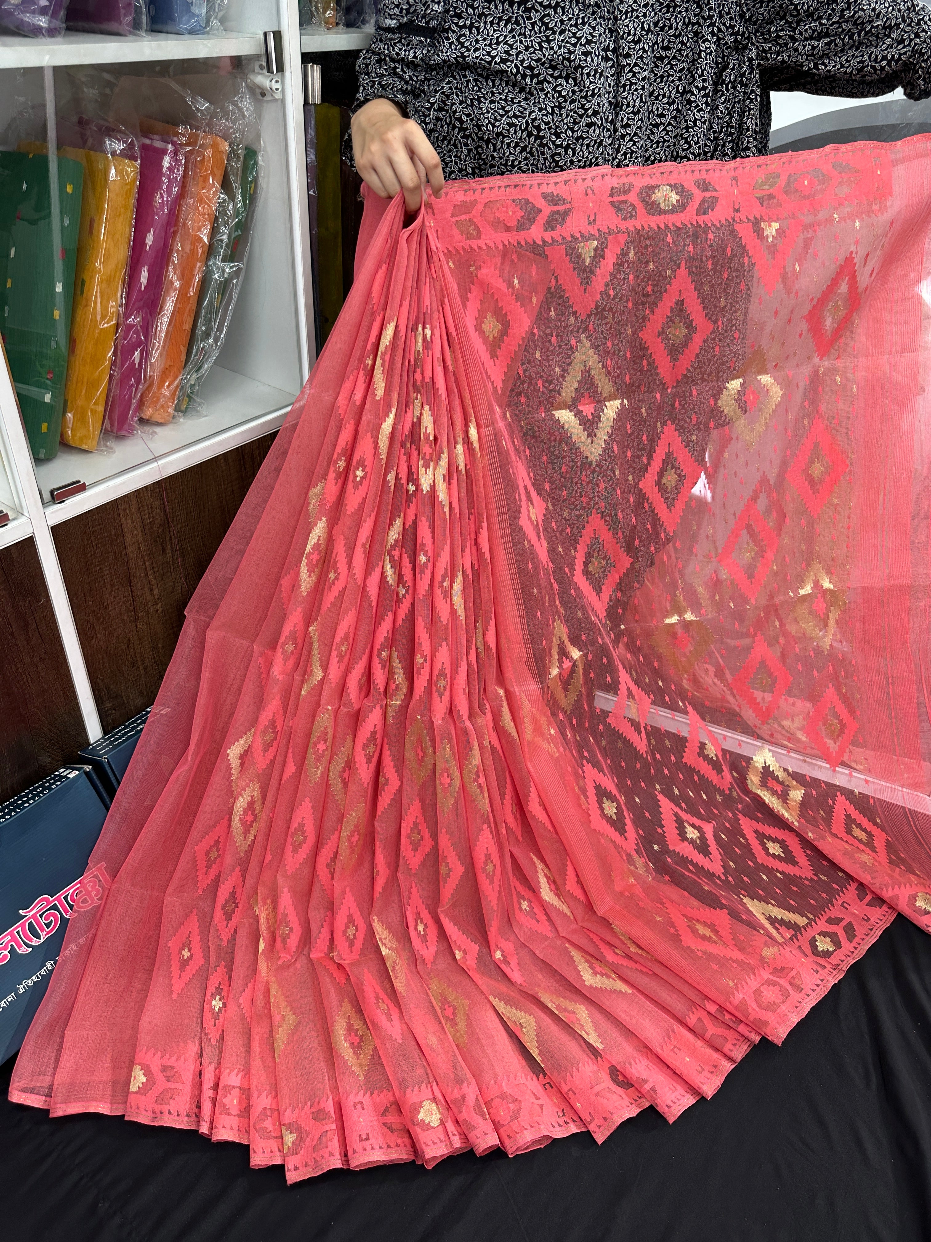 Georgia peach halfsilk jamdani saree with self threads work and golden jori work